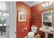 Stylish powder room with decorative paint, updated fixtures, and neutral accents at 11995 Gray Eagle Dr, Fishers, IN 46037