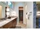 Modern bath with dual vanity, shower, and walk in closet at 1311 Central Ave, Indianapolis, IN 46202