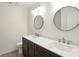 Modern bathroom showcasing double sink vanity with beautiful countertops and contemporary fixtures at 13264 Penneagle Dr, Carmel, IN 46033