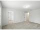 Bedroom showcases neutral carpet and easy access to walk-in closet at 13264 Penneagle Dr, Carmel, IN 46033