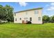 Two-story home featuring well-maintained lawn, a patio, and plenty of space for outdoor enjoyment at 13264 Penneagle Dr, Carmel, IN 46033