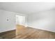 Bright and airy living room with hardwood floors and neutral walls, ready for personalization at 13264 Penneagle Dr, Carmel, IN 46033