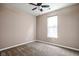 Bedroom offers carpeted floor, neutral paint, and natural light from the window at 1418 Blackthorne S Trl, Plainfield, IN 46168