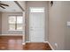 Bright foyer with hardwood floors and view into the living space at 1418 Blackthorne S Trl, Plainfield, IN 46168