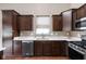Well-appointed kitchen with stainless steel dishwasher and modern appliances at 1418 Blackthorne S Trl, Plainfield, IN 46168