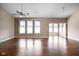 An open concept living area features hardwood floors, neutral paint, and tons of natural light at 1418 Blackthorne S Trl, Plainfield, IN 46168