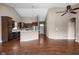 Open-concept living space featuring hardwood floors and vaulted ceilings at 1418 Blackthorne S Trl, Plainfield, IN 46168