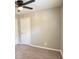 Calm bedroom with carpeted floors, neutral paint and an overhead ceiling fan with light at 1605 S Leland Ave, Indianapolis, IN 46203