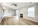 Living room featuring stylish floors, fireplace, and sliding glass door to outdoor patio at 1657 Park Terrace Ct, Indianapolis, IN 46229