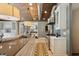 Open kitchen with stainless steel appliances and large center island for entertaining at 1805 Wood Valley Dr, Carmel, IN 46032