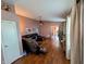 Cozy living room featuring wood floors and a stylish, comfortable leather sectional at 1823 Long Lake Dr, Greenwood, IN 46143