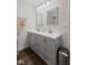 Bathroom featuring a double sink vanity, drawers for storage, and attractive lighting at 1930 Bechtel Rd, Indianapolis, IN 46260