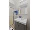 Bathroom featuring a vanity with a modern sink and chrome fixtures and a glass enclosed shower at 1930 Bechtel Rd, Indianapolis, IN 46260