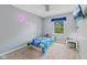 Cozy bedroom with gray walls, plush carpet, and a Paw Patrol themed bedspread at 1930 Bechtel Rd, Indianapolis, IN 46260