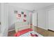 Comfortable bedroom with great natural light, closet, and laminate wood flooring at 1930 Bechtel Rd, Indianapolis, IN 46260