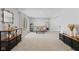Inviting living room with neutral carpet, stylish decor, and ample natural light at 1930 Bechtel Rd, Indianapolis, IN 46260