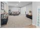 Bright living room with neutral carpet, modern furnishings, and a welcoming atmosphere at 1930 Bechtel Rd, Indianapolis, IN 46260