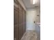 Practical laundry room with neutral tones, closet, and modern washer and dryer at 19555 Kailey Way, Noblesville, IN 46062
