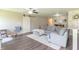 Inviting living room with a comfortable sectional sofa, and barn door at 19555 Kailey Way, Noblesville, IN 46062