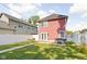 Spacious backyard with a hot tub, patio, and well-kept lawn at 2015 N College Ave, Indianapolis, IN 46202
