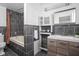 Nicely tiled bathroom featuring a soaking tub and updated vanity with modern fixtures at 2015 N College Ave, Indianapolis, IN 46202