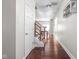 Welcoming foyer with hardwood floors and staircase leading to the upper level at 2015 N College Ave, Indianapolis, IN 46202