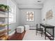 A bright office with modern desk, shelves and cubes provides the perfect space for working from home at 2015 N College Ave, Indianapolis, IN 46202