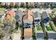 Overhead view of a two-story home with a backyard patio, detached garage, and surrounding neighborhood at 2332 Central Ave, Indianapolis, IN 46205