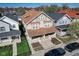 An aerial view of the two-story home showcasing its well-maintained yard and neighborhood surroundings at 2332 Central Ave, Indianapolis, IN 46205