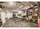 Finished basement featuring gym equipment, painted walls, and an open ceiling at 2332 Central Ave, Indianapolis, IN 46205