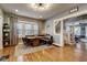Charming dining area featuring hardwood floors, natural light and stylish decor at 2332 Central Ave, Indianapolis, IN 46205