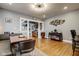 Stylish dining area featuring hardwood floors, modern lighting, and an open layout at 2332 Central Ave, Indianapolis, IN 46205