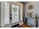 Inviting foyer featuring a rustic console table, stylish decor, and a glimpse through the front door at 2332 Central Ave, Indianapolis, IN 46205