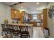 Modern kitchen with granite countertops, stainless steel appliances, and a breakfast bar at 2332 Central Ave, Indianapolis, IN 46205