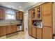 Spacious kitchen featuring a window, stainless steel appliances, and lots of cabinet space at 2332 Central Ave, Indianapolis, IN 46205