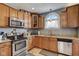 Well-equipped kitchen with stainless steel appliances and granite countertops at 2332 Central Ave, Indianapolis, IN 46205