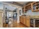 View of fireplace and wet bar in a spacious living area, with hardwood floors at 2332 Central Ave, Indianapolis, IN 46205