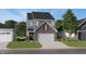 Charming two-story home with a brick-accented garage, a landscaped yard, and a welcoming entrance at 3549 Sugar Grove Dr, Whitestown, IN 46075