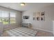 Bedroom with natural light, decor, and cube storage with drawers next to the window at 3679 Woodruff Pl, Bargersville, IN 46106
