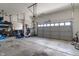 Spacious three car garage with tools and plenty of storage space at 3679 Woodruff Pl, Bargersville, IN 46106