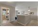 Upstairs hallway leading to the laundry room with modern machines and natural light at 3679 Woodruff Pl, Bargersville, IN 46106