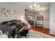 A home entrance featuring a grand piano, hardwood floors and stylish decor at 3679 Woodruff Pl, Bargersville, IN 46106
