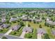 Aerial view of single-Gathering home with well-manicured lawns and mature trees in a quiet neighborhood at 370 Vinewood S Dr, Brownsburg, IN 46112
