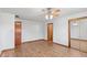 Bright bedroom with wood-look flooring, two closets, and ample space at 370 Vinewood S Dr, Brownsburg, IN 46112