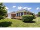 Well-maintained single-Gathering home with brick facade, green lawn, and manicured landscaping at 370 Vinewood S Dr, Brownsburg, IN 46112