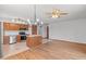 Kitchen featuring ample cabinet space and stainless steel appliances flowing into the dining area at 370 Vinewood S Dr, Brownsburg, IN 46112