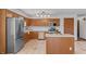 Well-equipped kitchen featuring stainless steel appliances, custom cabinetry, and a functional center island at 370 Vinewood S Dr, Brownsburg, IN 46112