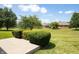 Scenic backyard featuring lush greenery and landscaping, perfect for relaxation and outdoor enjoyment at 370 Vinewood S Dr, Brownsburg, IN 46112