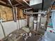 View of the basement showing mechanicals at 3836 N Wittfield St, Indianapolis, IN 46235