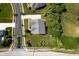 Aerial view of property with a large yard, mature trees, and a well-maintained neighborhood at 3853 Abney Highland Dr, Zionsville, IN 46077